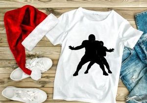 American football player tackling silhouette in action