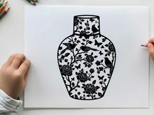 Silhouette of a decorative vase with floral pattern and birds silhouette