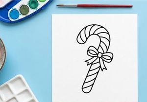 Christmas candy cane line art illustration with a decorative bow on white background