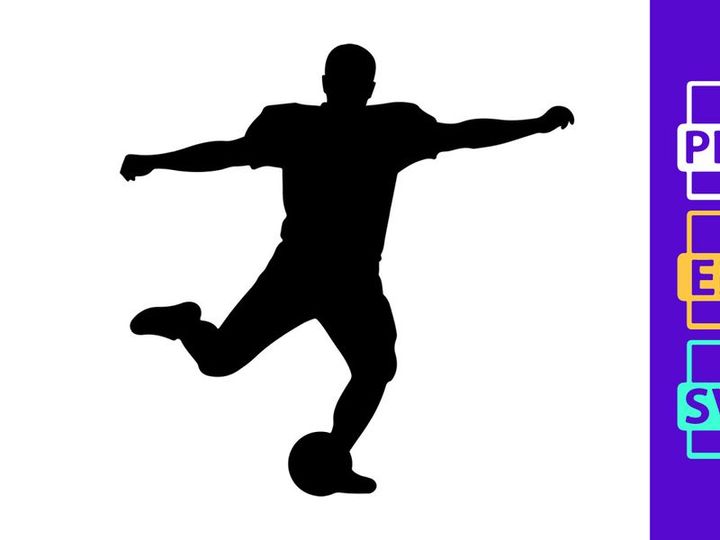 Silhouette of a soccer player kicking a ball in mid action