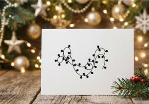 Black silhouette of Christmas fairy lights string isolated on a white background