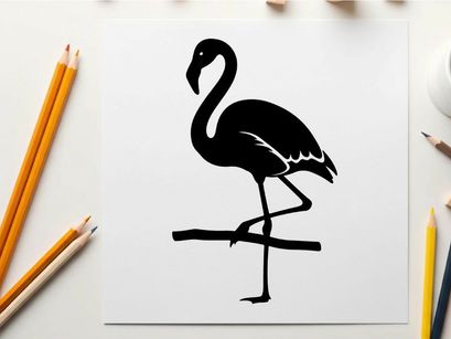 Silhouette of a flamingo standing on one leg