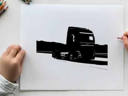 Silhouette of a large truck driving on a road
