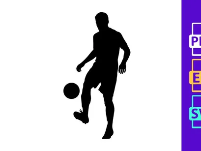 Silhouette of a soccer player kicking a ball in mid action