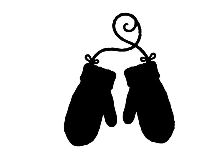 Silhouette of Christmas mittens hanging on a string for holiday decor