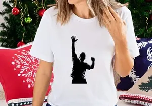 A silhouette of a person with one arm raised in triumph or celebration