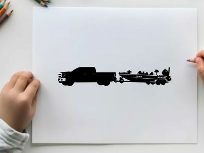 Silhouette of a pickup truck towing a fishing boat