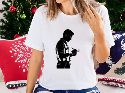 A silhouette of a man in a reflective vest writing on a clipboard