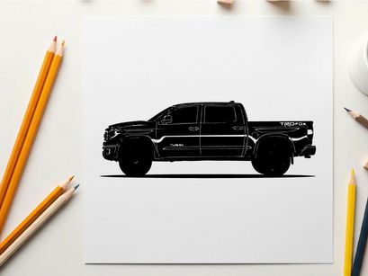 Silhouette of a black pickup truck against a white background