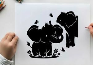 Silhouette of two elephants and butterflies in flowers