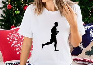 Silhouette of a man running in a dynamic pose with one leg extended