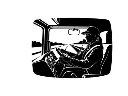 Silhouette of a truck driver driving on the highway in his vehicle