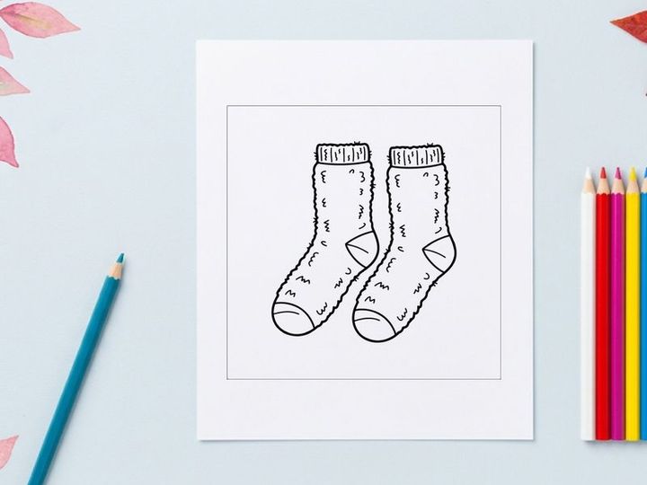 Hand-drawn Christmas socks with doodle designs and festive holiday patterns for seasonal decor