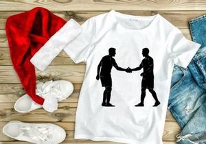 Two men shaking hands in a gesture of agreement or friendship