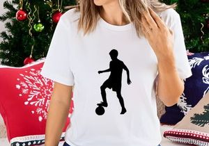 Silhouette of a soccer player skillfully dribbling three balls