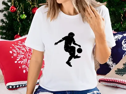 A soccer player kicking a ball in mid air with dynamic movement and energy