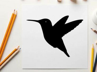 Silhouette of a hummingbird in flight against a white background