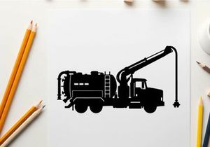 Silhouette of a large industrial vacuum truck with crane and hose