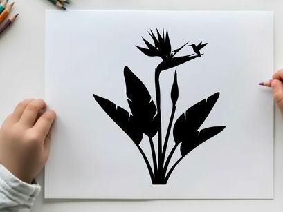 Silhouette of a hummingbird and flower plant