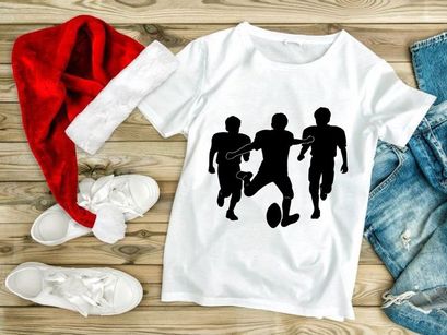 Three silhouette football players in action running with ball