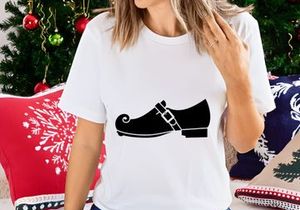 Black leather dress shoe with lace detail on white background