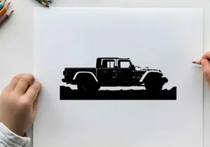 Silhouette of a jeep truck against a mountainous landscape silhouette