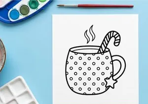 Steaming hot coffee mug with star and candy cane on Christmas morning celebration