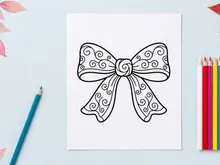 Decorative Christmas bow line art illustration for holiday design and coloring pages