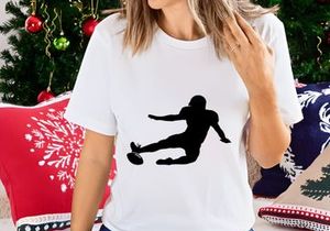Rugby player kicking ball in mid action dynamic movement