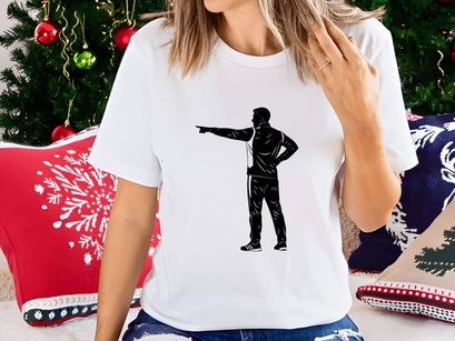 A man pointing to the left with his right hand on his hip