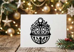 Decorative Christmas bell silhouette with intricate floral patterns and holly leaves