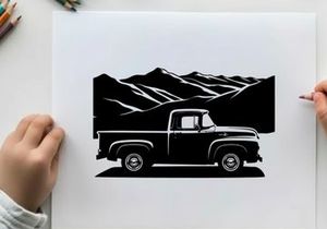 Vintage truck silhouette against majestic mountain range