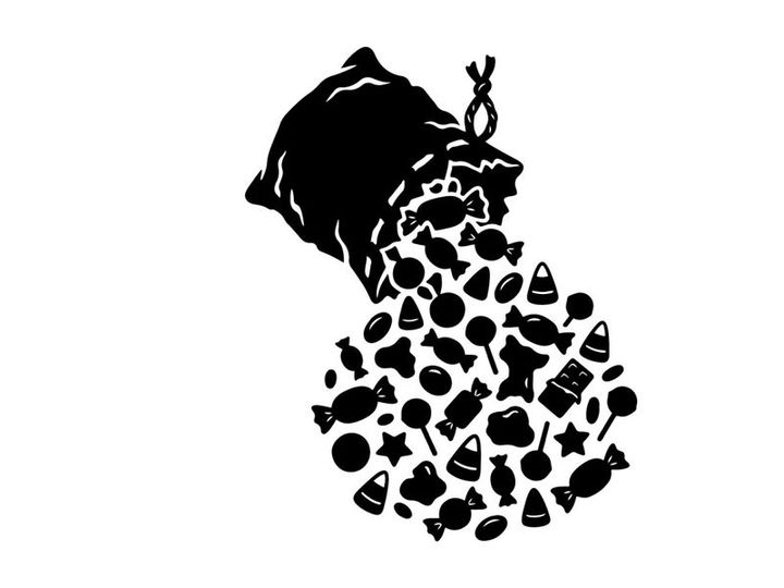 Silhouette of a hand pouring a variety of pills and capsules