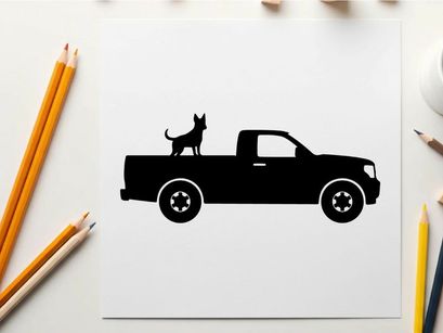 Silhouette of a pickup truck with a dog in the bed