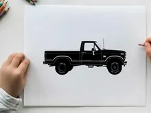 Silhouette of a classic pickup truck with a long bed and two doors
