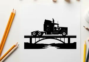 Silhouette of a semi truck on a bridge over a river