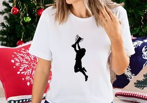 A person jumping in the air with a trophy cup
