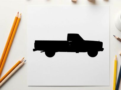 Silhouette of a classic pickup truck against a white background