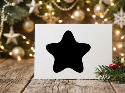 Cute Black Star-Shaped Cookie with Festive Decorations
