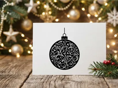 Adorno navideño de color negro y blanco con diseño elegante de motivos florales entrelazados
