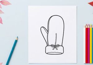 Hand-drawn Christmas gift bag with bow and floral cut-out design for holiday packaging