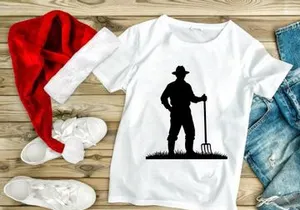 Rural Farmer with Pitchfork in Grass Silhouette
