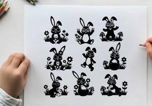 Black silhouette easter bunnies in flowers and grass