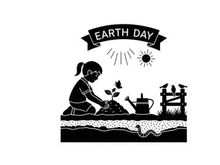 Earth day silhouette of a girl planting a tree