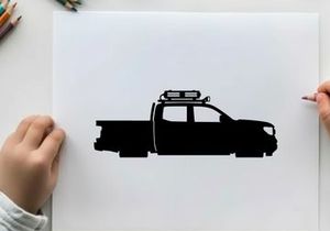 Silhouette of a pickup truck with roof rack