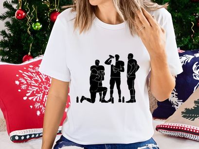 Three football players in a huddle with beer bottles on the ground around them