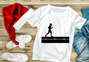 Silhouette of a football player running with the ball on a field