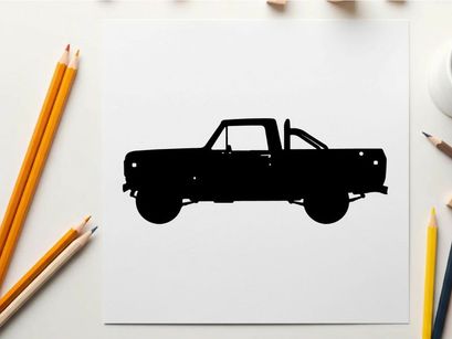 Silhouette of a classic pickup truck against a white background