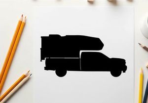 Silhouette of a delivery truck with cargo on top