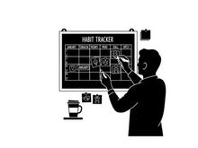 Silhouette of man using habit tracker on a whiteboard
